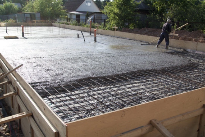 Understanding Concrete Slabs design and load-bearing capacity for optimal residential and commercial applications in Boston, MA. A Boston Concrete Work guide