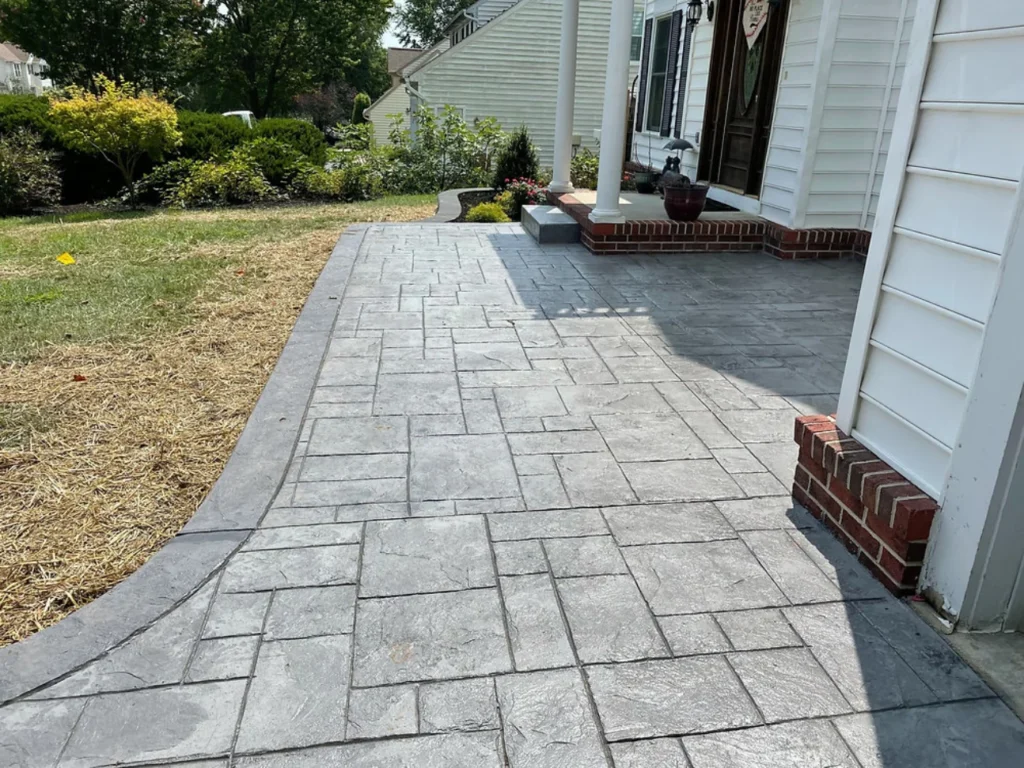 Versatile stamped concrete providing a high return on investment (ROI) for homeowners in Boston, MA. Boston Concrete Work specializes in natural stone and brick patterns