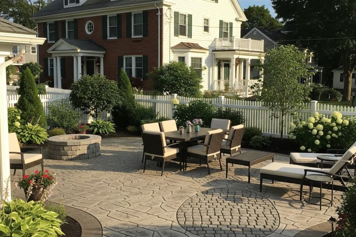 Durable, expertly sealed stamped concrete patio that mimics natural slate, guaranteeing quality from Boston Concrete Work for homes in Boston, MA